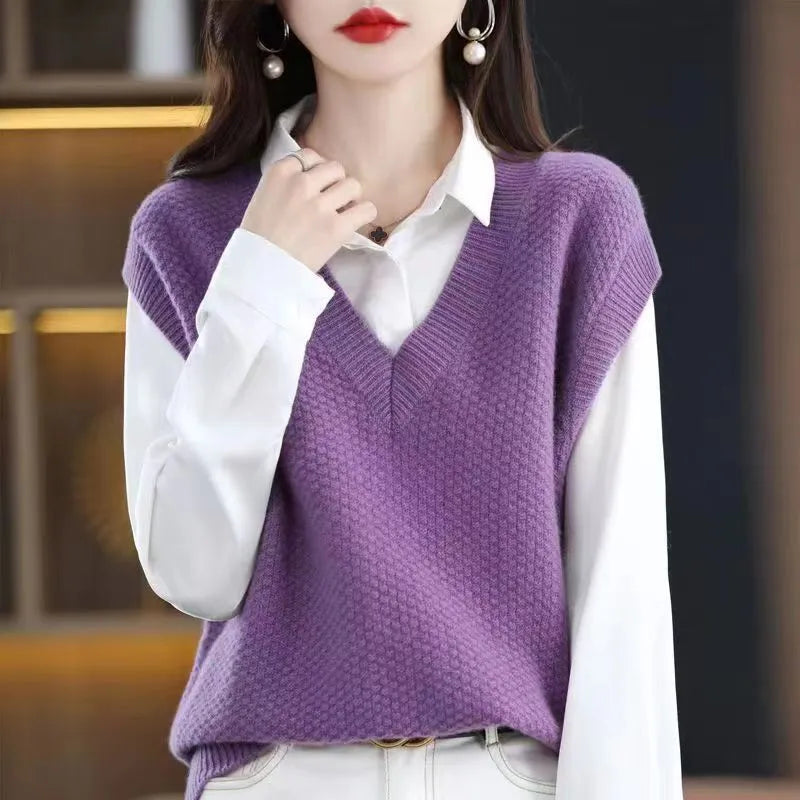 Sleeveless pullover vest with 3D knit pattern in creamy-white colour, shown on hanger