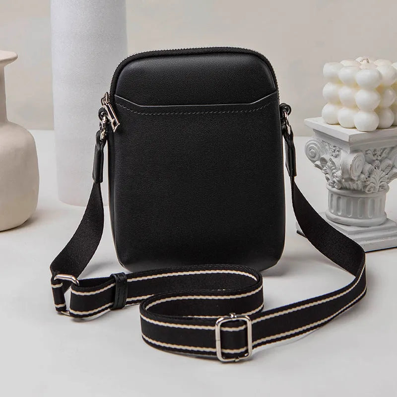 Small solid-colour PU crossbody shoulder bag for mobile phone.
