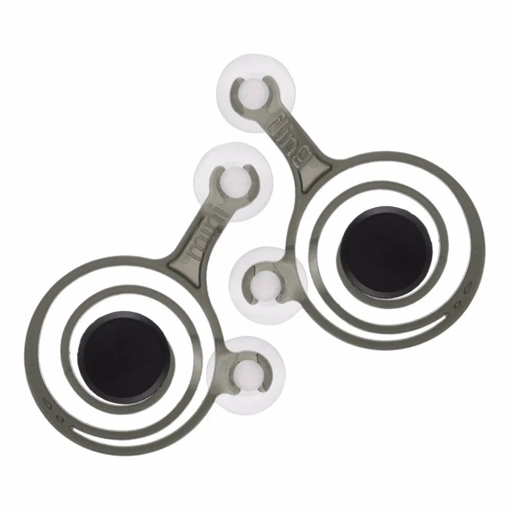 A pair of clear and black mini joysticks for mobile phone touch screen gaming control.