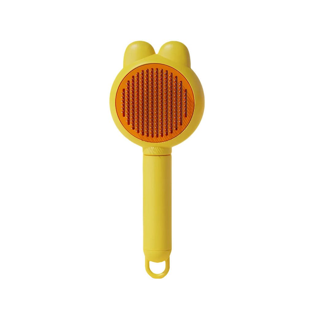 Green self-cleaning pet grooming brush with release button and stainless steel comb on a white background