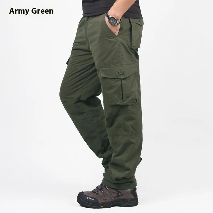 Men's stonewashed cotton overalls with a thick wool lining in khaki, shown with a loose straight-leg fit.