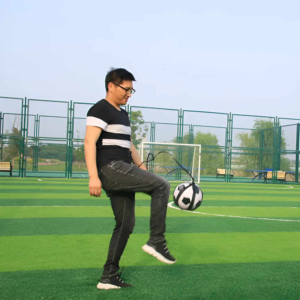 Black football juggling belt with rotating mechanism and 2 metre static length for foot skill training