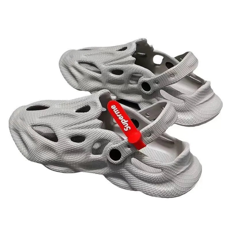 Grey closed-toe EVA coconut slippers on a flat sole