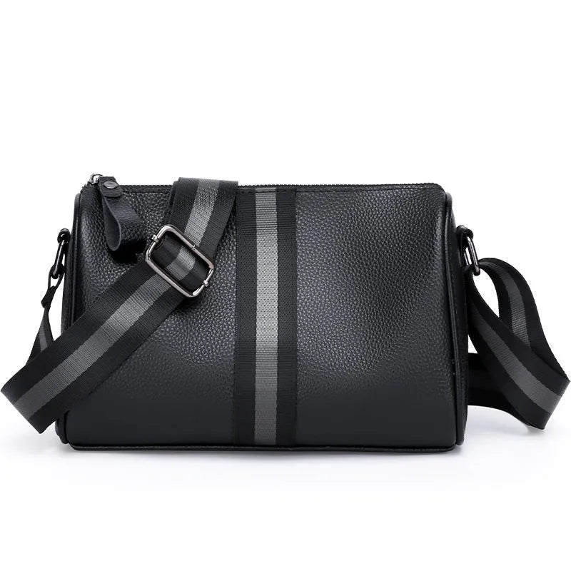 Black genuine leather one-shoulder crossbody bag showing front view and size.