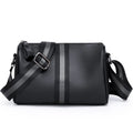 Black genuine leather one-shoulder crossbody bag showing front view and size.