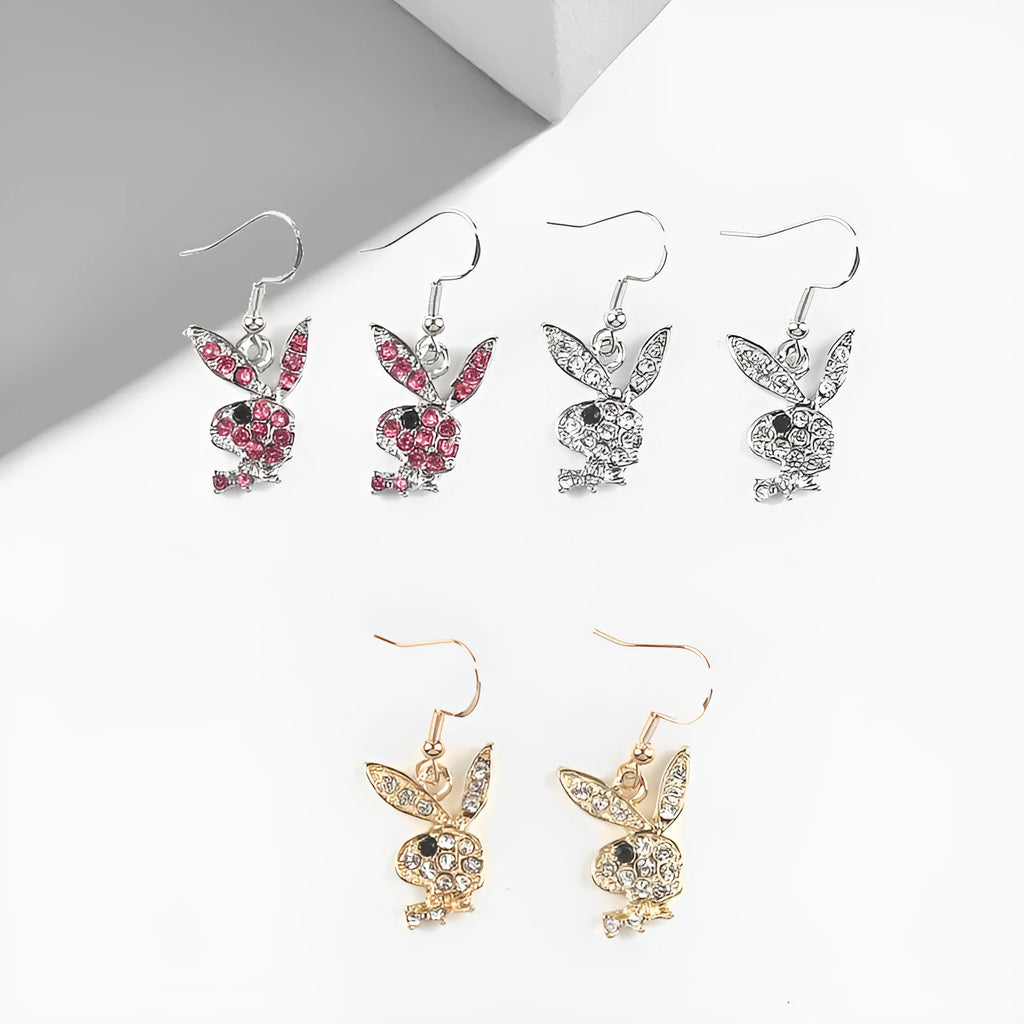 Silver, pink, and gold alloy stud earrings with a full diamond cartoon rabbit design.
