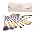 Persian makeup brush set with rice white bristles and champagne coloured handles showing multiple brush types