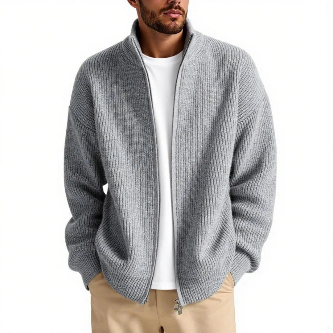 Men's loose-fit cardigan sweater in a grey colour, showing button front and long sleeves.