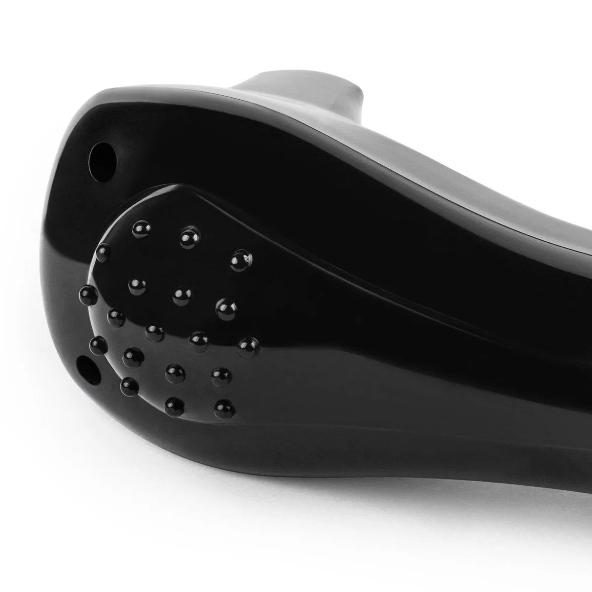 Black folding electric body hair shaver with battery compartment.