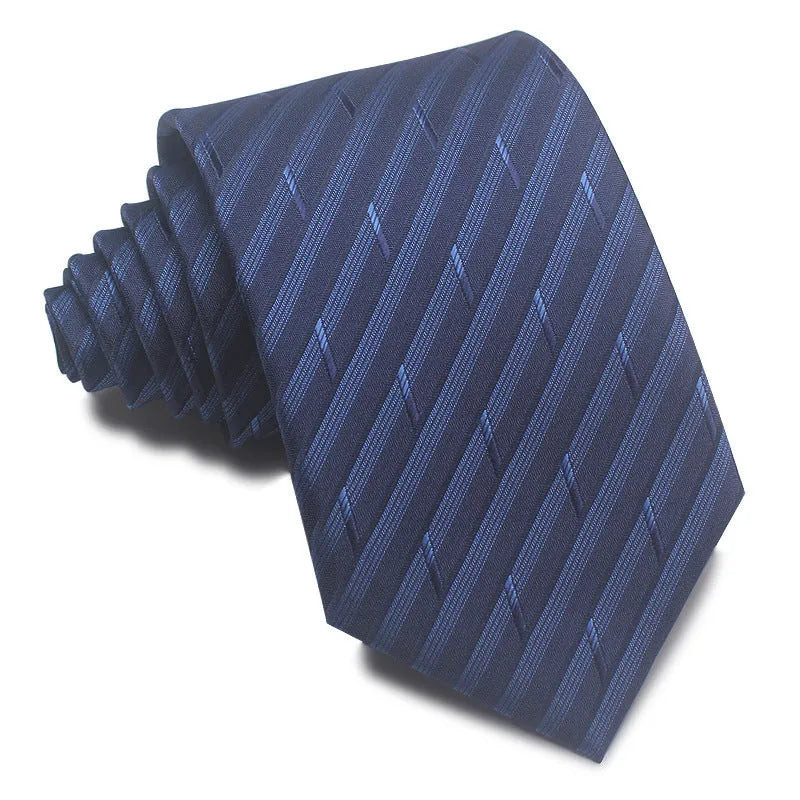 Close-up of a red, black, and blue striped men's formal tie with a textured Jacquard weave.