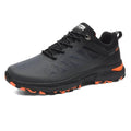 Men's black breathable mesh running shoe with lace-up front and rubber sole.