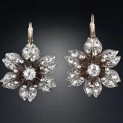 Silver retro fashion earrings for women with creative design and electroplated alloy construction