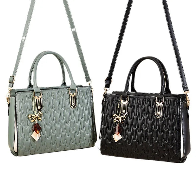 Women's large polyester messenger bag with multiple front pockets in green colour.