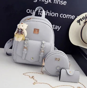 Women's three-piece floral PU leather backpack set with school backpack, shoulder bag, and card purse