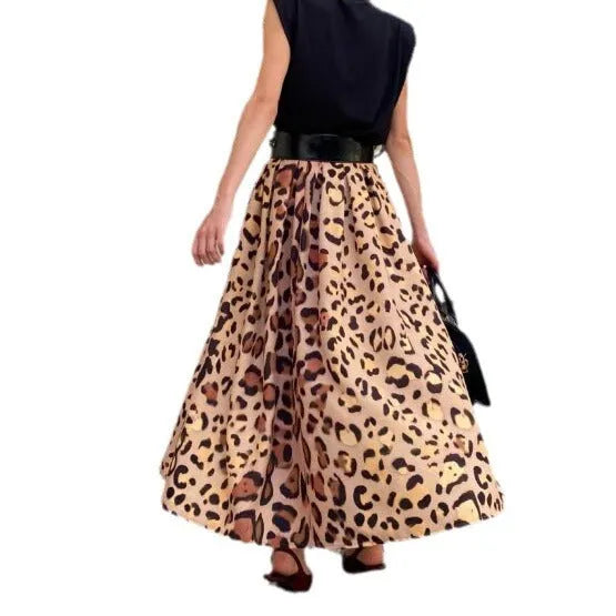 Brown leopard print women's A-line long skirt with big hem design shown in socialite styling