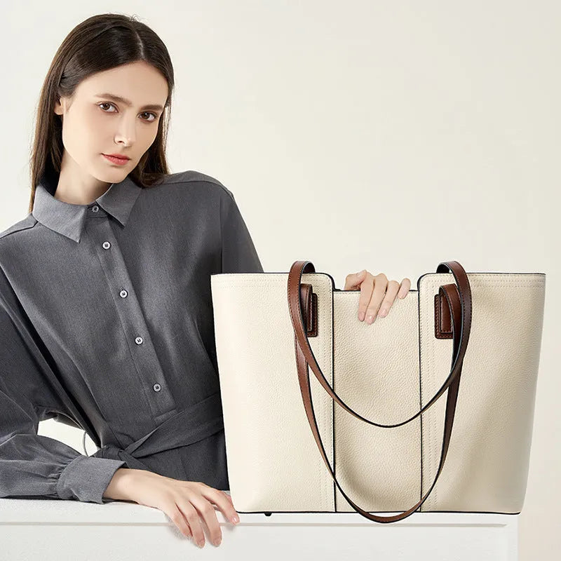 Women's genuine leather commuter shoulder bag with multiple internal zippered compartments in black colour