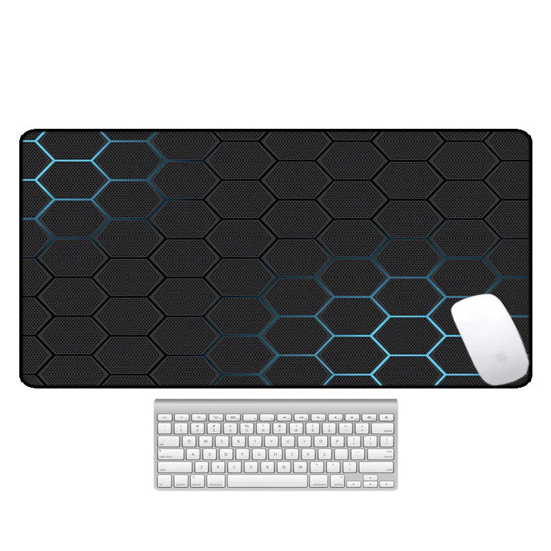 Large printed desk mat with natural rubber non-slip base on a wooden desk with keyboard and mouse.