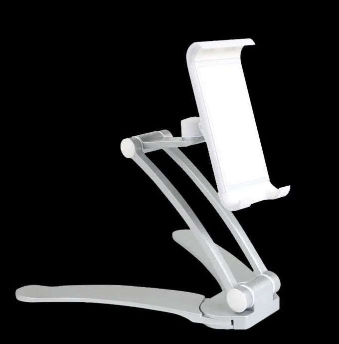Silver aluminium alloy desktop tablet stand holding a tablet, showing 360-degree rotation adjustment.