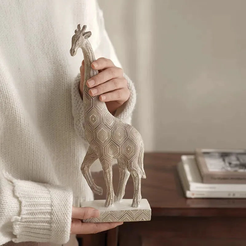 Wood colour synthetic resin giraffe ornament on a table, showing European style and 30.5cm height.