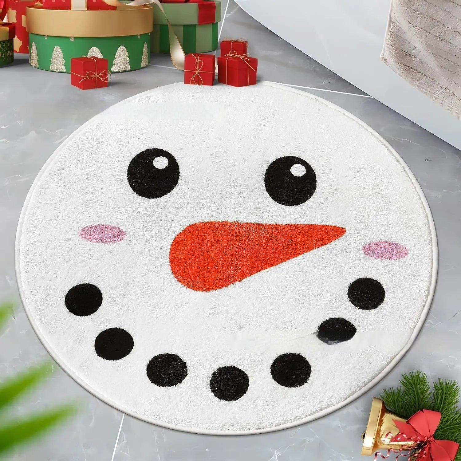 Round printed Christmas carpet on floor in festive red and green pattern.