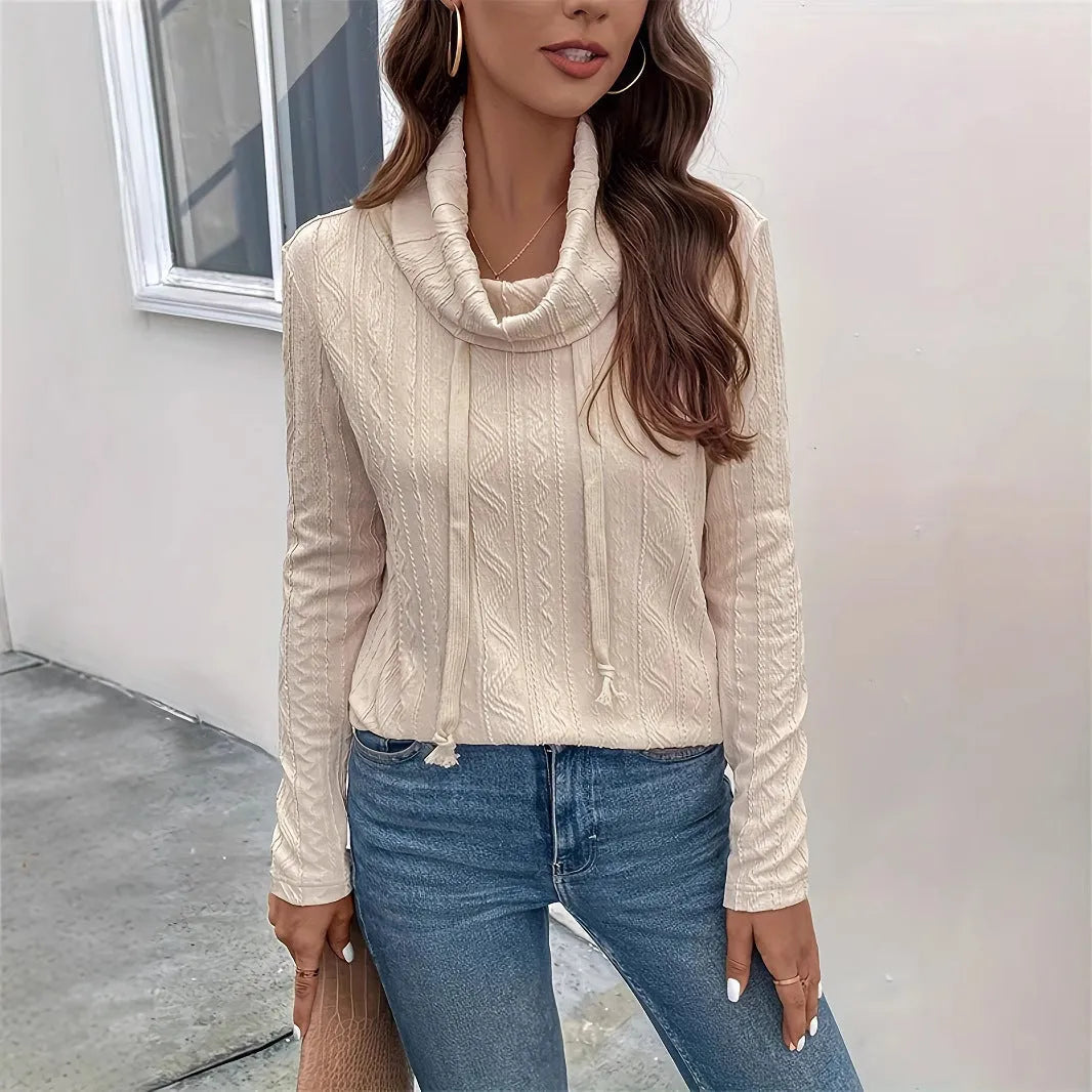 Apricot coloured hooded pullover sweater with long sleeves and drawstring