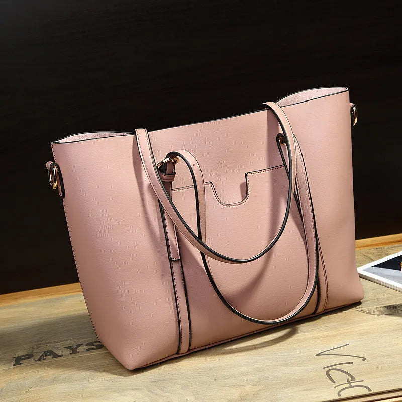 Retro-style brown PU messenger bag for women shown with shoulder strap, displaying its large main compartment.