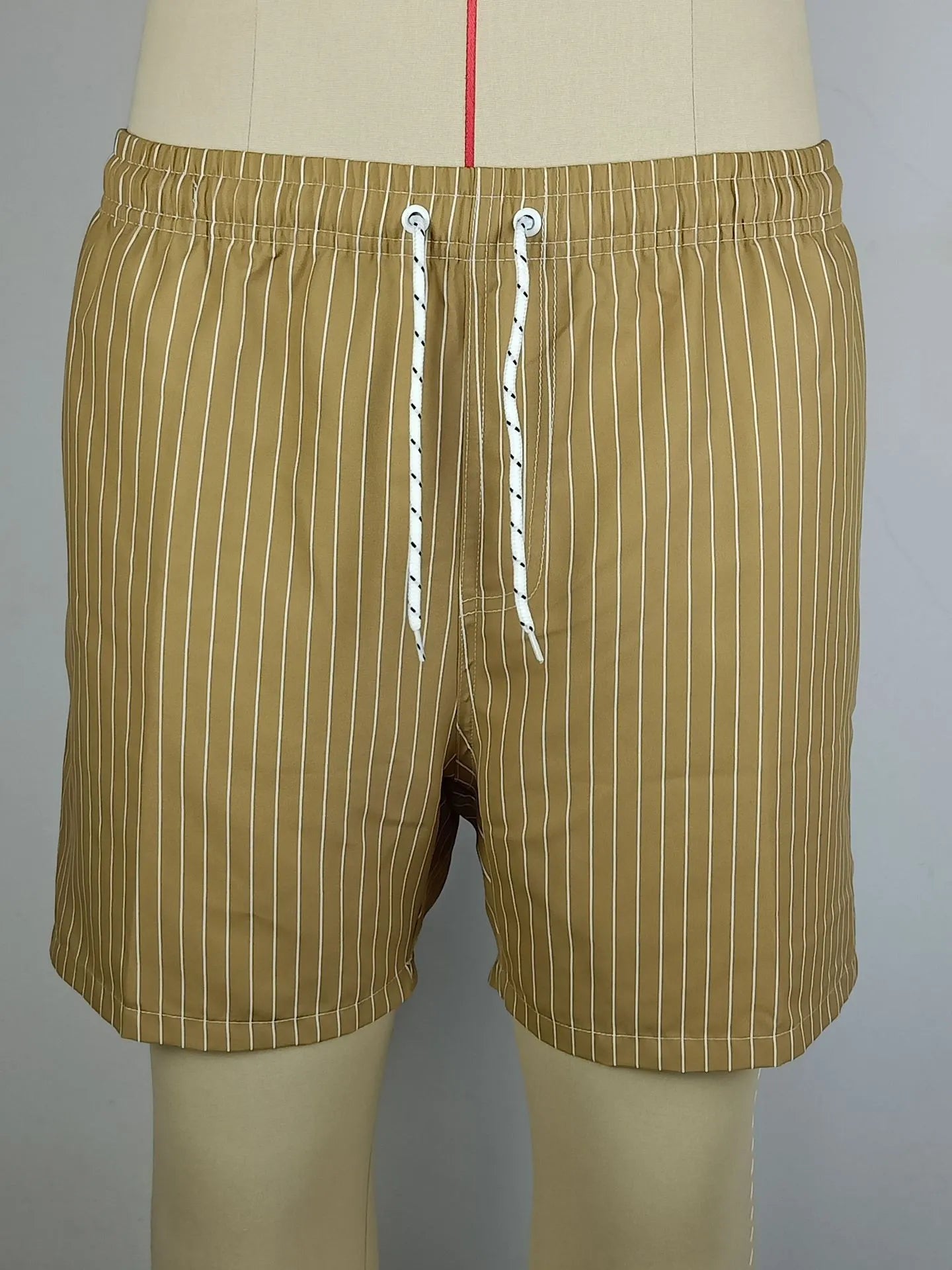 Men's striped beach shorts with straight legs and triangle lining in polyester fibre blend fabric