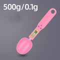 Black electronic measuring spoon scale showing digital display, 23.2cm long.