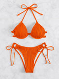 Women's apricot coloured split bikini swimsuit with steel wire bracket support.