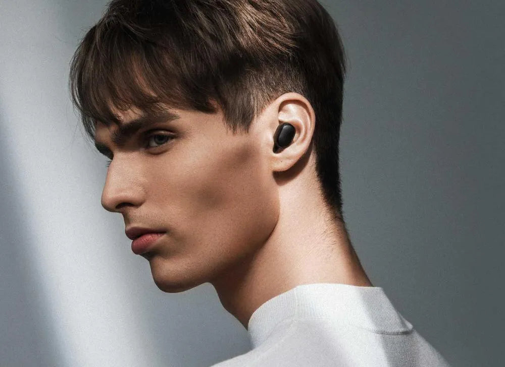Redmi AirDots 2 black true wireless Bluetooth earbuds and charging case.