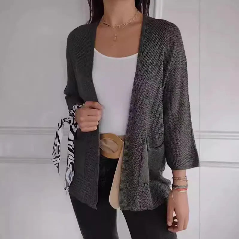 Women's waffle texture cardigan coat in army green with nine-quarter sleeves and pockets.