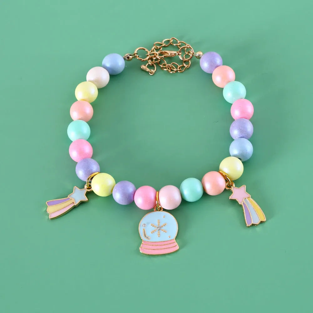 Macaron-colour pet collar with moon and pearl resin charms and a matching bracelet.