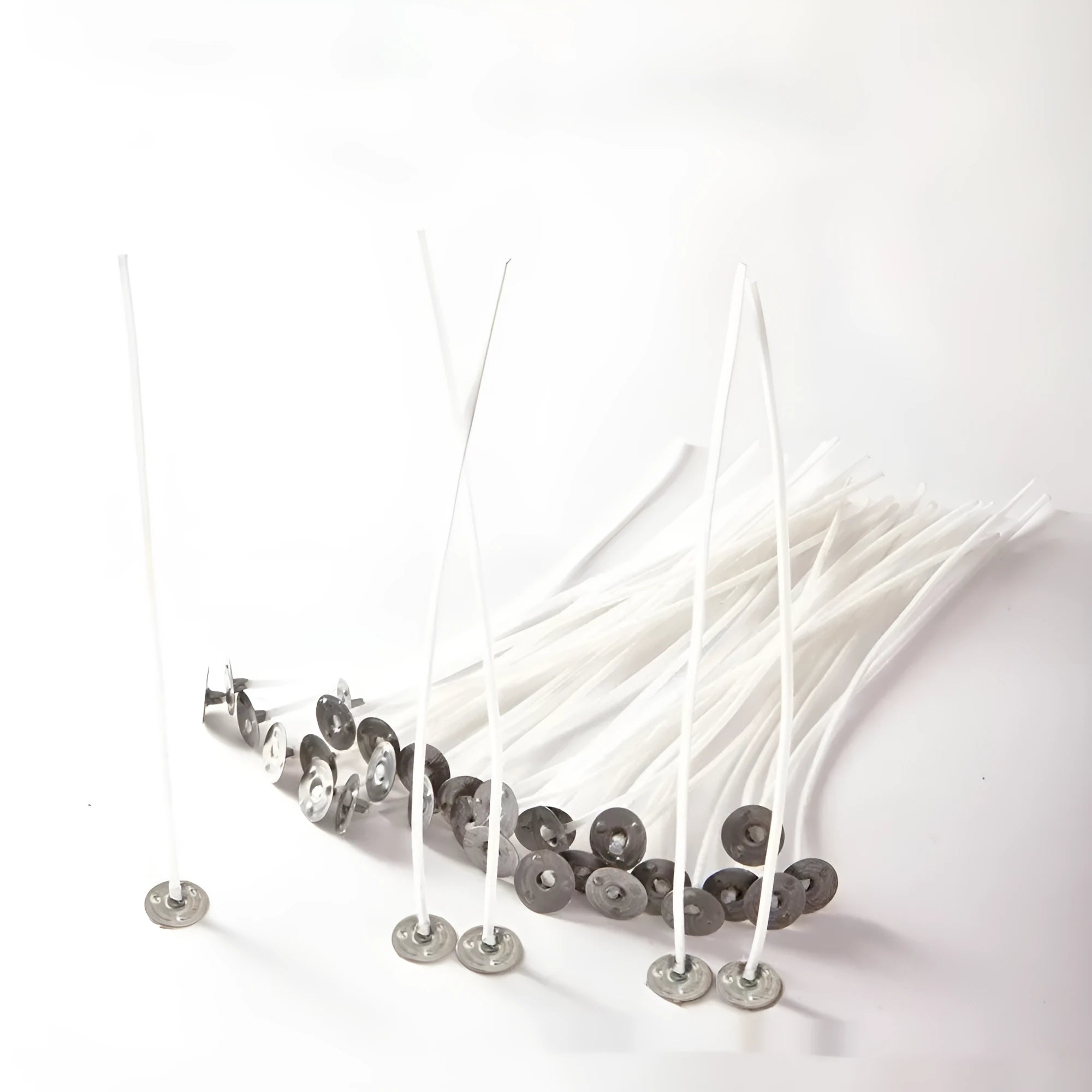 White cotton candle wicks showing three length options: 2.6cm, 6cm and 8cm for DIY candle making