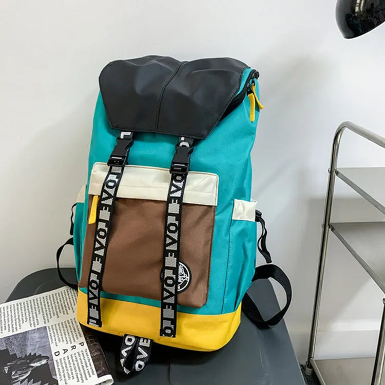 Oxford cloth backpack shown in black, green, or red, featuring multiple carry handles and straps.