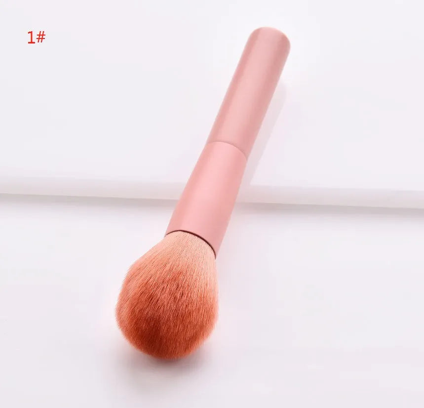 Ten-piece wooden handle makeup brush set with nylon bristles including powder, foundation, and double-ended brushes
