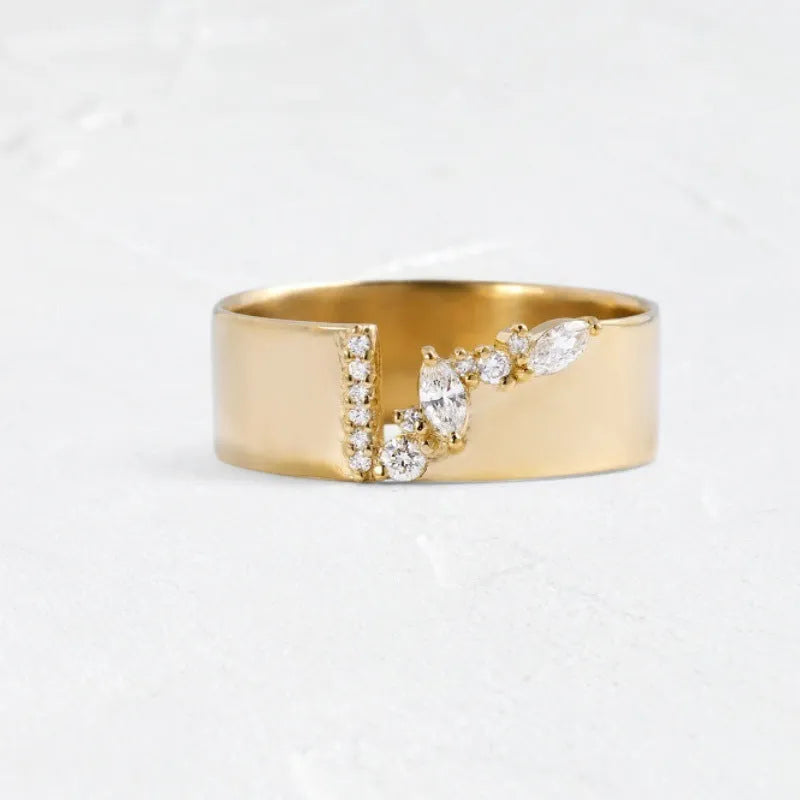 Gold electroplated zircon ring on finger showing shining finish and decorative detail