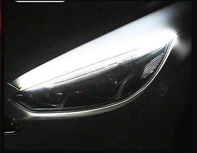 Flexible silicone car LED daytime running light strip with flowing turn signal animation, shown in multiple colours.