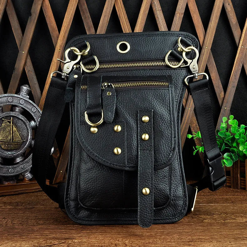 Men's black genuine cowhide leather punk-style fanny pack worn on the waist.