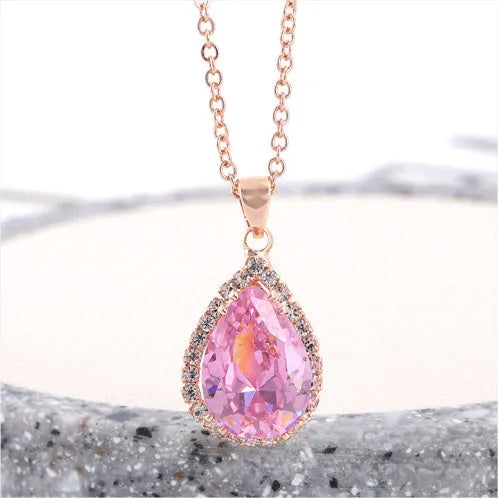 Rose gold pink drop shape women's necklace with geometric rhinestone detailing and alloy construction