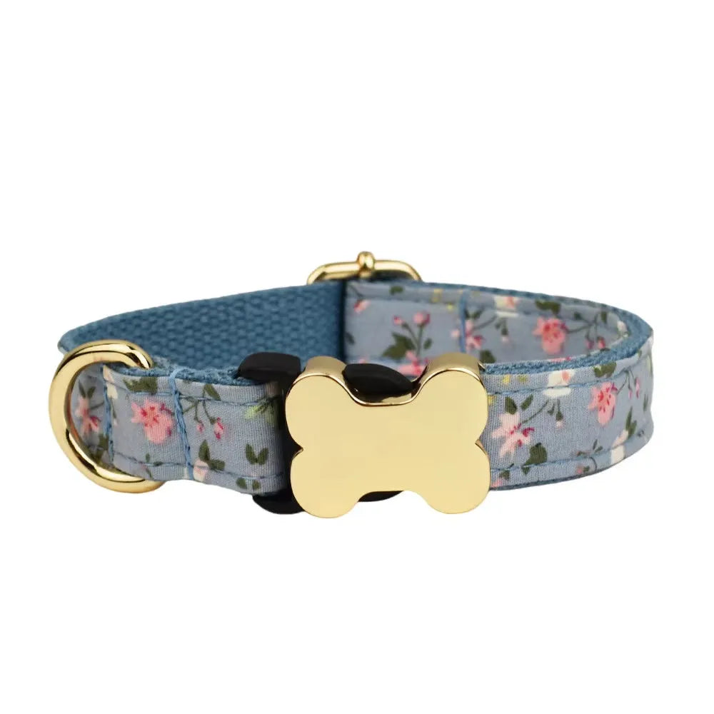 Nylon dog collar with printed grid pattern and a bone-shaped metal buckle in a selected colour.
