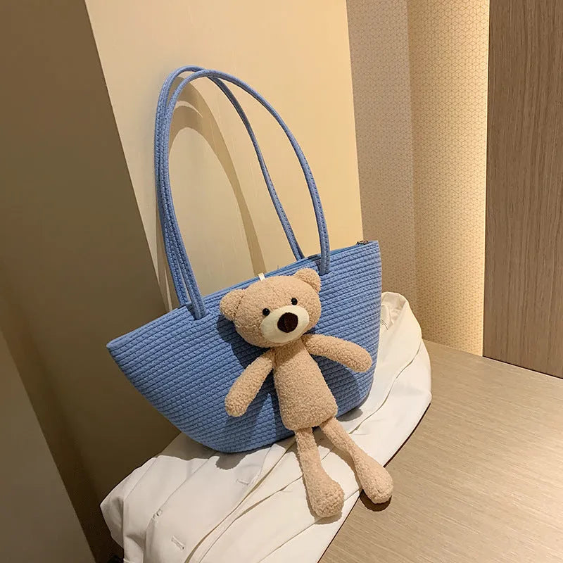 Cotton and linen woven bag with dumpling shape, double shoulder straps, and three-dimensional pocket