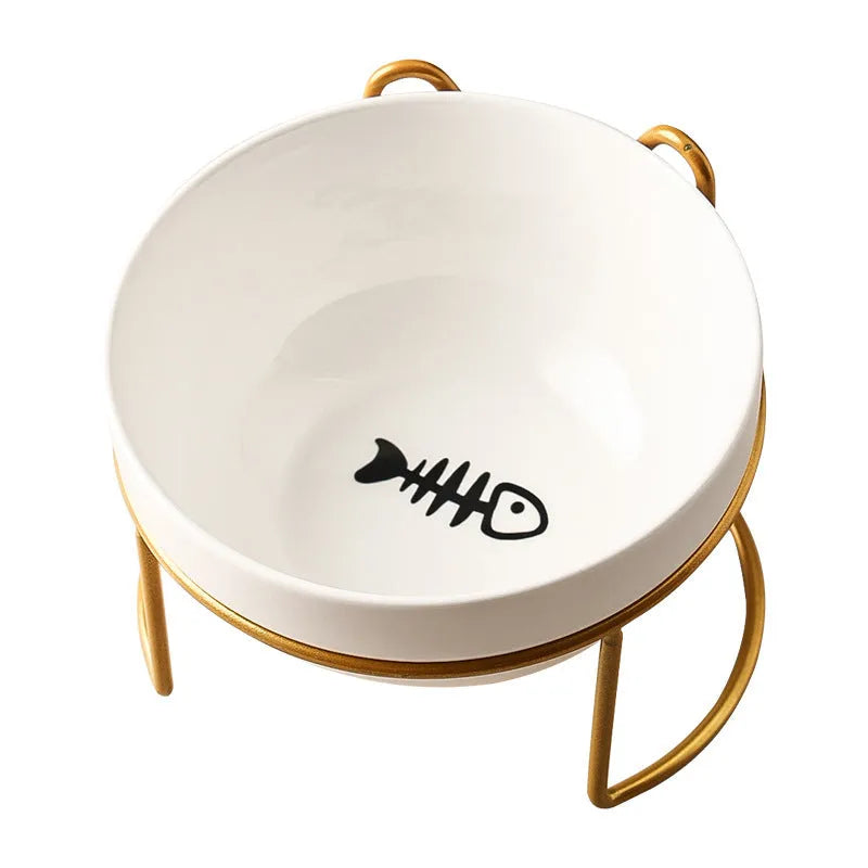 White ceramic pet bowl with cat paw print pattern in black iron frame stand