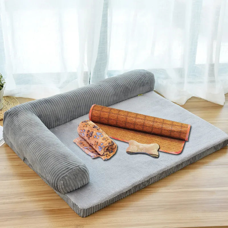 Corduroy pet sofa dog bed in grey colour with a non-slip base, shown in a bilateral style.