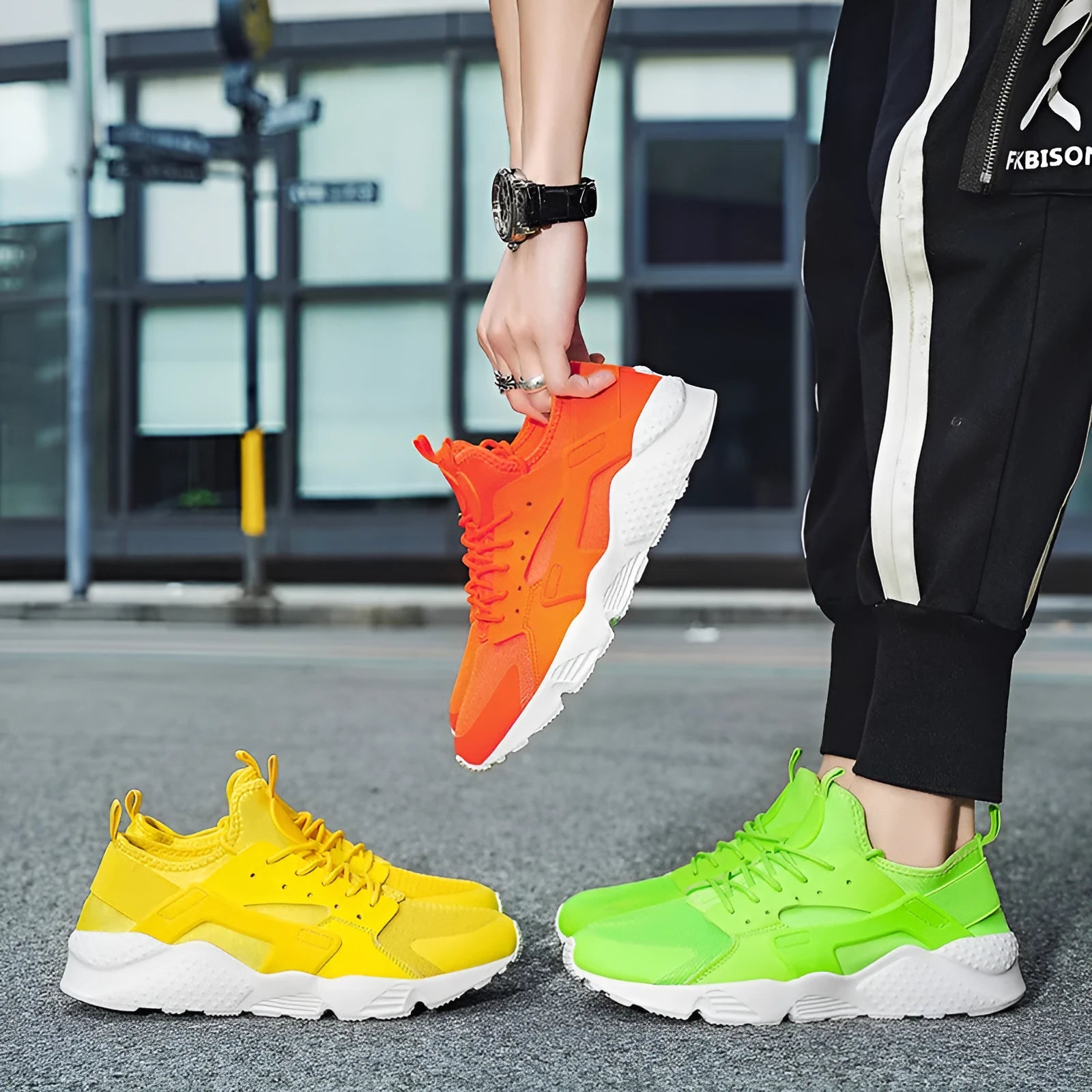 Men's low top casual shoes with cross strap design and mesh construction in fluorescent colours