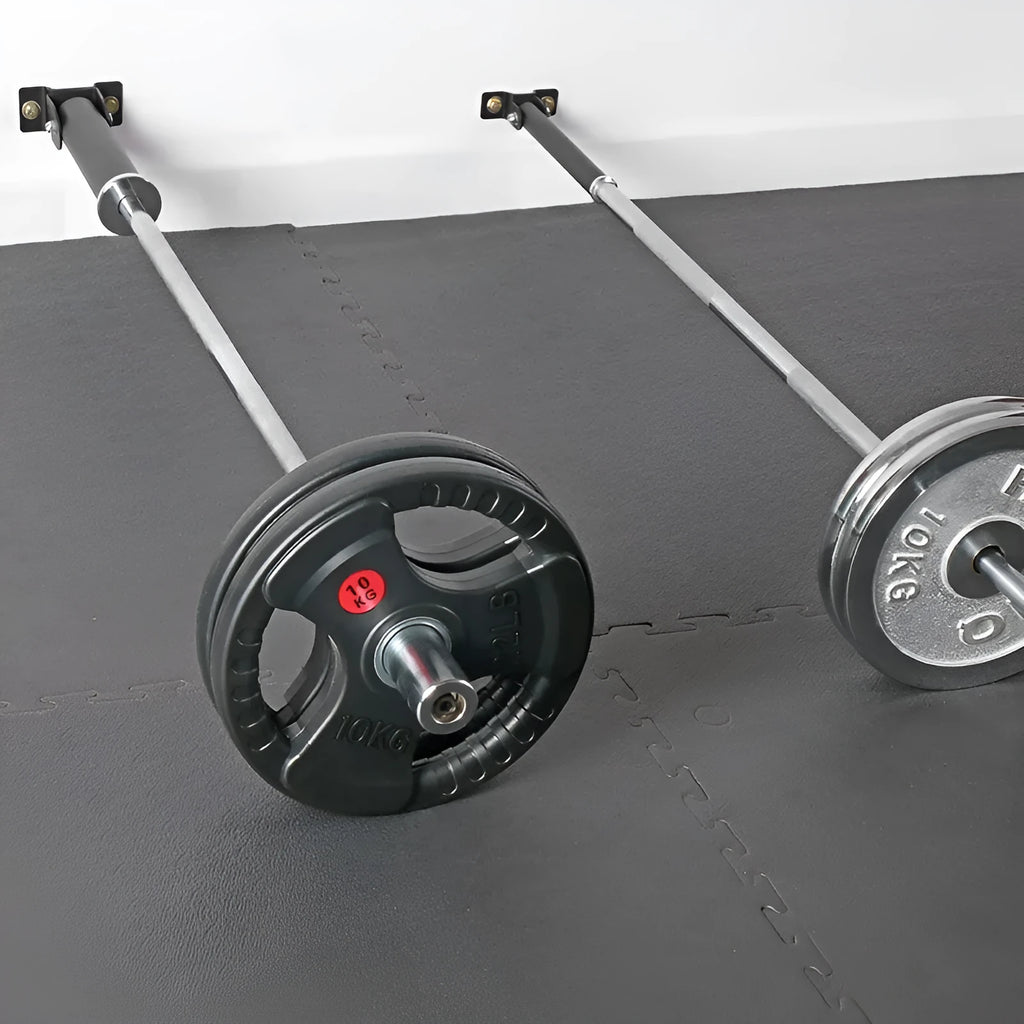 Steel wall-mounted barbell rack with 25 vertical tubes for shotgun barrel storage.