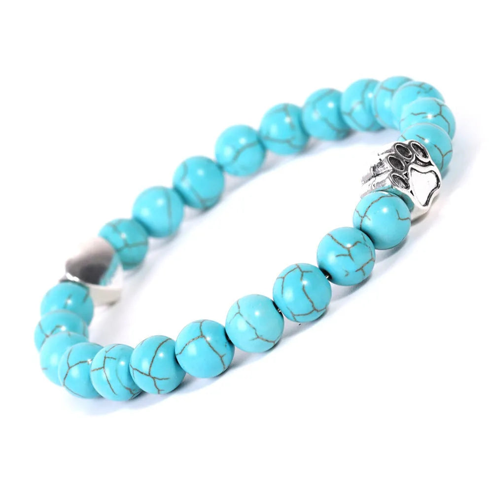 Tigereye Indian Agate stone bracelet with dog paw and love heart charms on wrist.