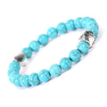 Tigereye Indian Agate stone bracelet with dog paw and love heart charms on wrist.