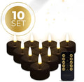 Four black S10 LED flameless tealight candles showing size and flickering LED light.