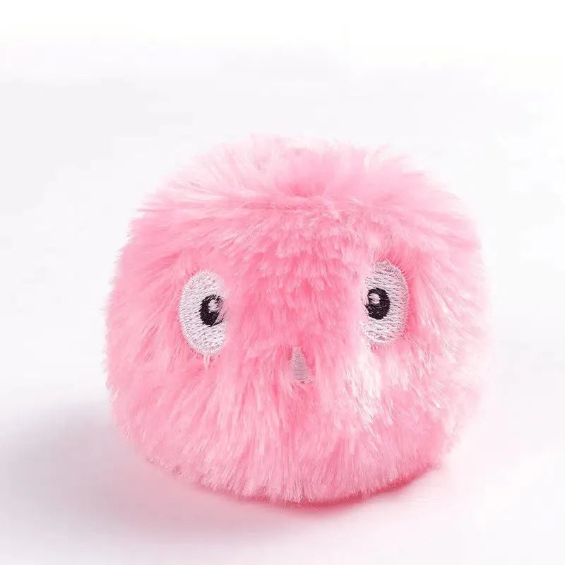 Interactive cat toy ball in blue, pink or yellow with sound activation and catnip compartment