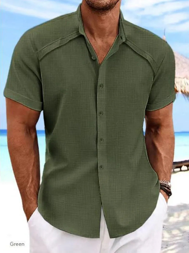 Men's solid colour short sleeve casual shirt in cotton blend fabric on a hanger.
